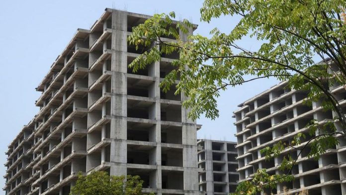 Krisis Properti China Sebabkan Agen Menunggak Gaji Karyawan 1